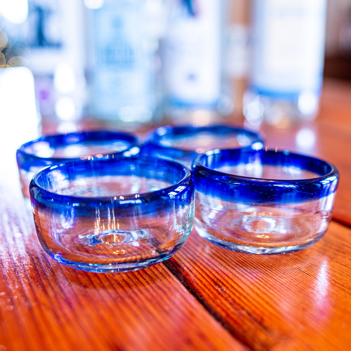 Two traditional jicama cups for drinking mezcal in Mexico, on their  rodete stands. Cups made from